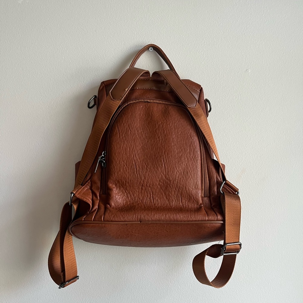 Backpack,pouch in the back,brown